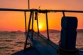 A stunning sunset over Phuket provides the backdrop to a traditional longtail boat, Phuket, Thailand Royalty Free Stock Photo