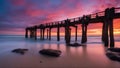 sunset over the pier A sunset or sunrise landscape, panorama of beautiful nature, beach with colorful red, orange and purple