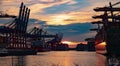 Sunset over the port of Hamburg - CITY OF HAMBURG, GERMANY - MAY 10, 2021 Royalty Free Stock Photo