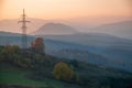 Sunset over power lines in the Caprathian Mountains, Ukraine Royalty Free Stock Photo