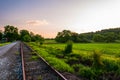 Sunset over railroad tracks and fields in York County, PA Royalty Free Stock Photo