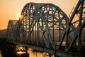 Sunset over railway bridge across Dnepr river Royalty Free Stock Photo