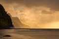 Sunset over the receding mountains of the Na Pali coast of Kauai in Hawaii Royalty Free Stock Photo