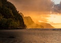 Sunset over the receding mountains of the Na Pali coast of Kauai in Hawaii Royalty Free Stock Photo