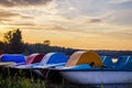 Sunset over the recreational lake, you can see boats. Beautiful orange colors, contrast. Holidays rest. Royalty Free Stock Photo