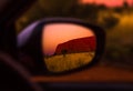 Sunset over Red Center area, view from a car, Rock Ayers, Australia Royalty Free Stock Photo