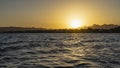 Sunset over the Red Sea. The sun is low Royalty Free Stock Photo