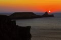 Sunset over Rhossili Bay and Worms head Royalty Free Stock Photo