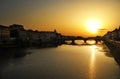 Sunset over river arno