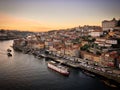 Sunset over the river Douro with the boats moored at Ribeira in Porto, Portugal, January 2019 Royalty Free Stock Photo