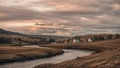 Sunset over the river flowing through the hills Royalty Free Stock Photo