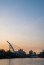 Sunset over river with modern suspension bridge in Tainan, Taiwan Royalty Free Stock Photo