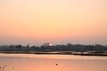 Sunset over the river rotte and waterstorage of the Eendragtspolder in Zevenhuizen, Netherlands Royalty Free Stock Photo