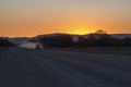 Sunset over Road in Sesfontein at Joubert-Pass, Namibia Royalty Free Stock Photo