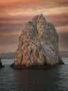Sunset over a Rock Formation in Cabo San Lucas, Mexico Royalty Free Stock Photo