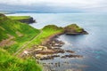 sunset over rocks formation Giants Causeway, County Antrim, Northern Ireland, UK Royalty Free Stock Photo