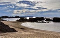 Sunset over the Rocky Antrim Coast silhouetting rocky Islands near Balintoy Harbour Royalty Free Stock Photo