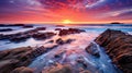 a sunset over a rocky beach Royalty Free Stock Photo