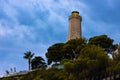 Sunset over rocky coast of Cap Ferrat cape with Phare Lighthouse near Saint-Jean-Cap-Ferrat resort town and Nice in France Royalty Free Stock Photo