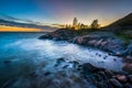 Sunset over rocky coast on Suomenlinna, in Helsinki, Finland. Royalty Free Stock Photo