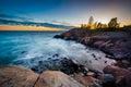 Sunset over rocky coast on Suomenlinna, in Helsinki, Finland. Royalty Free Stock Photo