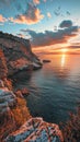 Sunset over rocky coastline with clear sky Royalty Free Stock Photo