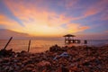 Sunset over rocky coastline Royalty Free Stock Photo