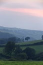 Sunset over rolling hillside of Dulverton, England Royalty Free Stock Photo