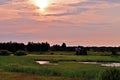Sunset over the Russian expanses in summer. Royalty Free Stock Photo