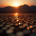 Sunset over the salt flats in death valley, nevada with small circles in the foreground and mountains in the background Royalty Free Stock Photo