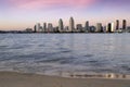 Sunset over the San Diego skyline across San Diego Bay from Coronado Island Royalty Free Stock Photo