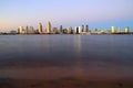 Sunset over the San Diego skyline across San Diego Bay from Coronado Island Royalty Free Stock Photo