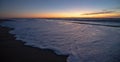 Sunset over Santa Clara River tidal outflow to Pacific Ocean at McGrath State Park on the California coast at Ventura - USA Royalty Free Stock Photo