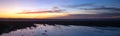 Sunset over Santa Clara River tidal outflow to Pacific Ocean at McGrath State Park on the California coast at Ventura - USA Royalty Free Stock Photo