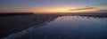 Sunset over Santa Clara River tidal outflow to Pacific Ocean at McGrath State Park on the California coast at Ventura - USA Royalty Free Stock Photo