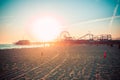 Sunset over Santa Monica beach with famous amusement park Royalty Free Stock Photo