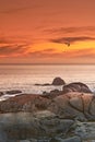 Sunset over a scenic beach. A piece of coastline found between Camps Bay and Clifton in Cape Town, South Africa. Royalty Free Stock Photo