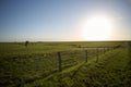 Sunset over scenic rural farmland Royalty Free Stock Photo