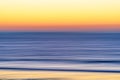 Sunset over the sea. Abstract background, line art, blur motion effect. Royalty Free Stock Photo