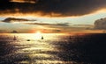 Sunset over the sea with boats Royalty Free Stock Photo