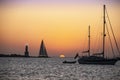 Sunset over the sea boats at anchor with a sky of a thousand colors. Royalty Free Stock Photo