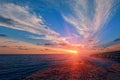 Sunset over sea caves of Ayia Napa at Cyprus with blue, crystal clear water