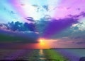 Sunset over sea clouds sun ray Royalty Free Stock Photo