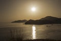 Sunset over the sea. Reflection of the solar track on the surfac Royalty Free Stock Photo