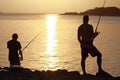 Son and dad at the fish water