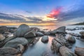 Sunset over the sea. Stone on the foreground Royalty Free Stock Photo