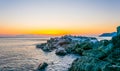 sunset over sea viewed from Riomaggiore village, Cinque terre, Italy....IMAGE Royalty Free Stock Photo