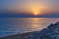 Sunset over the sea on wild beach of Persian gulf coast. Iran Royalty Free Stock Photo