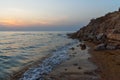 Sunset over the sea on wild beach of Persian gulf coast. Iran