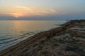 Sunset over the sea on wild beach of Persian gulf coast. Iran Royalty Free Stock Photo